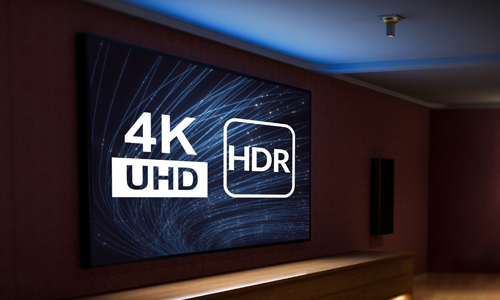 Theater room with 4K and HDR logos on screen