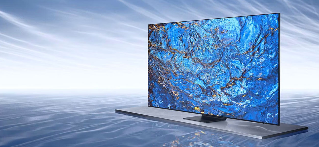 A Neo QLED TV is displaying a blue graphic, seemingly floating on a fluid-like surface.