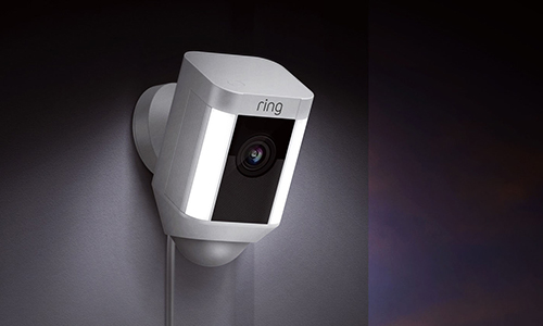 Ring Wired Spotlight camera with lights on in dark