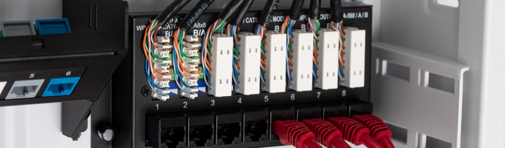 Close up of CAT6A being inserted into  punchdown