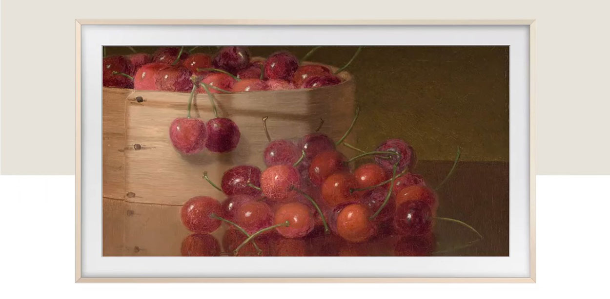 The Frame TV shows a painting of cherries with the PANTONE Validated and PANTONE SkinTone Validated certification stamps.