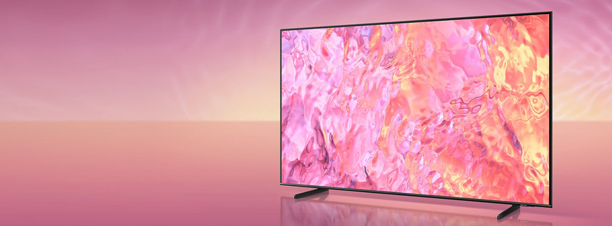 A QLED TV with a new simple stand is displaying pink graphic  on its screen.