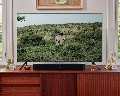 Black Beam and television on a credenza
